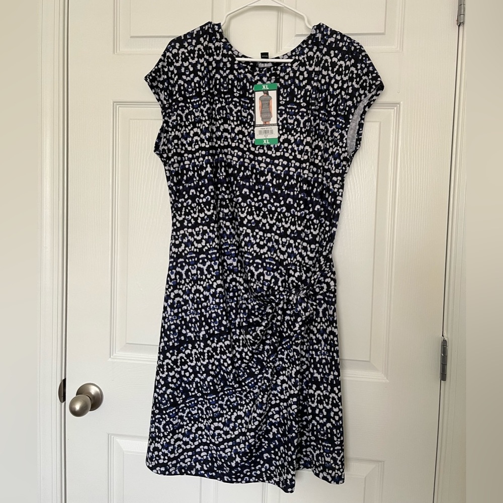 Flowing blue design dress, never worn, has tie/scrunch at waste
